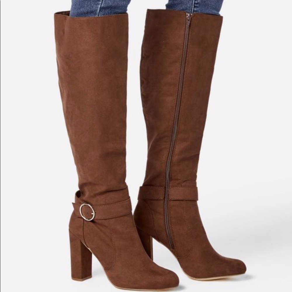 Brown heeled knee high boots